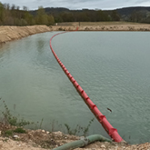 Barrage de confinement installé dans un bassin de décantation | DIFOPE